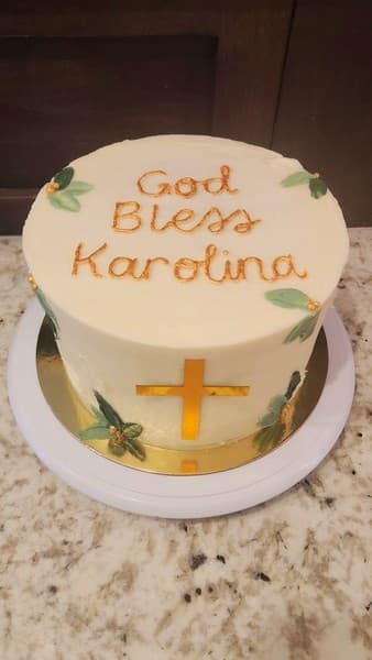 baptism cake made with a cross on the front